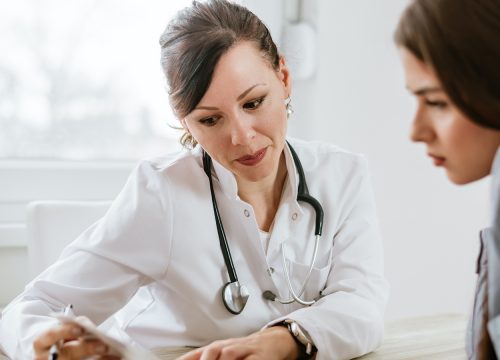 Doctor discussing an endometrial biopsy with a patient